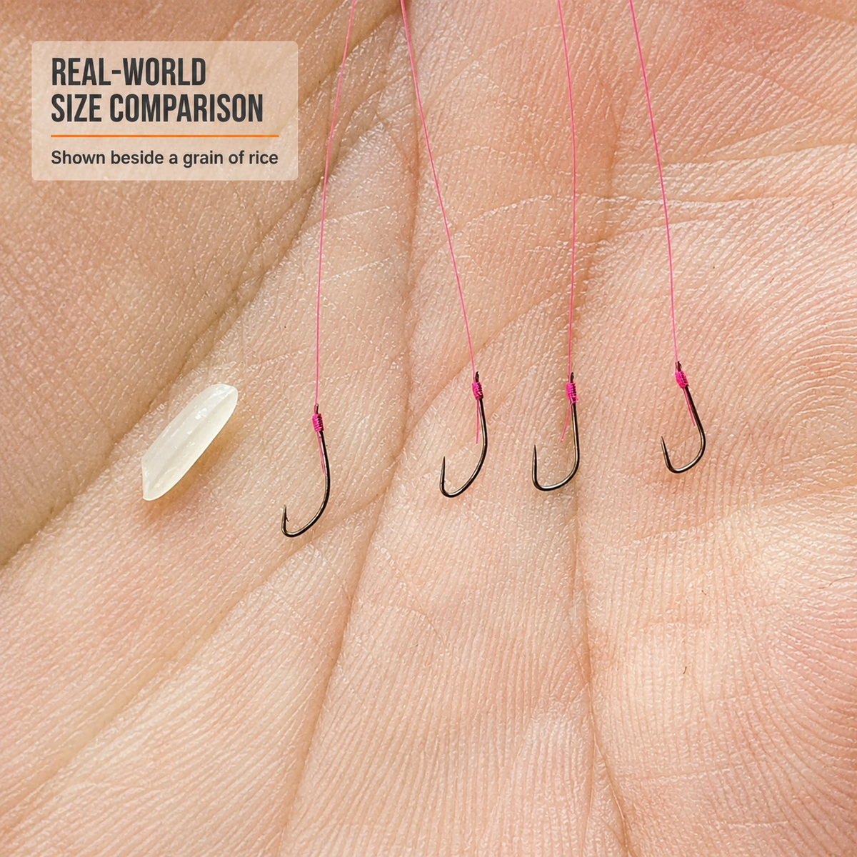 Four pre-tied tanago hooks shown beside a grain of rice for real-world size comparison