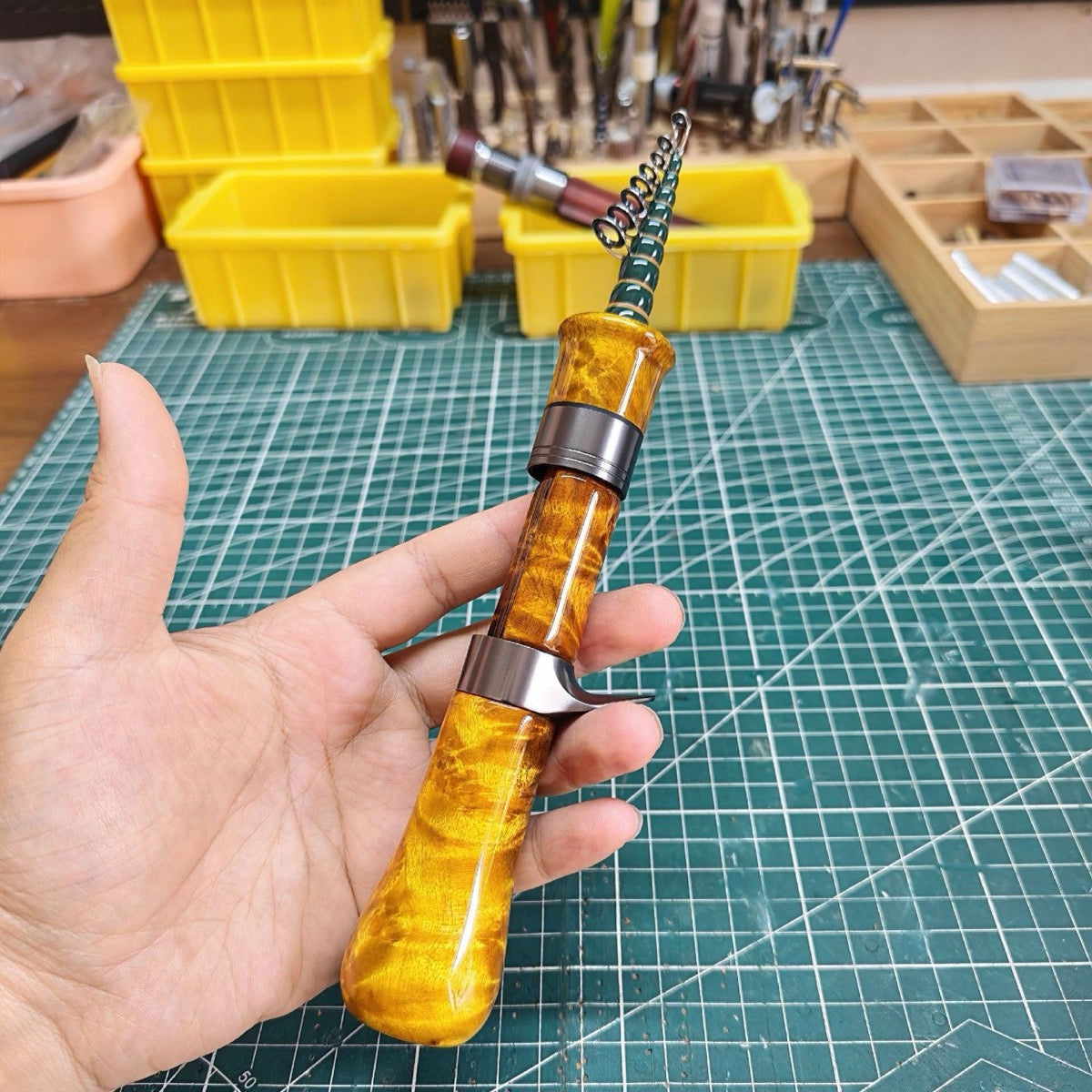 Casting trigger grip structure example; colors and materials are chosen separately.