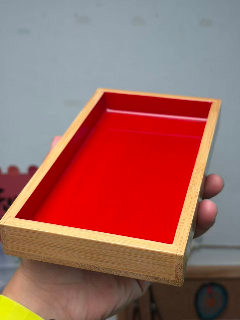 Original front view of the plain red urushi fish viewing box and frame