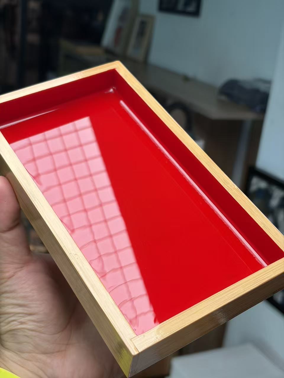 Original plain red lacquer interior with a window reflection and visible rim