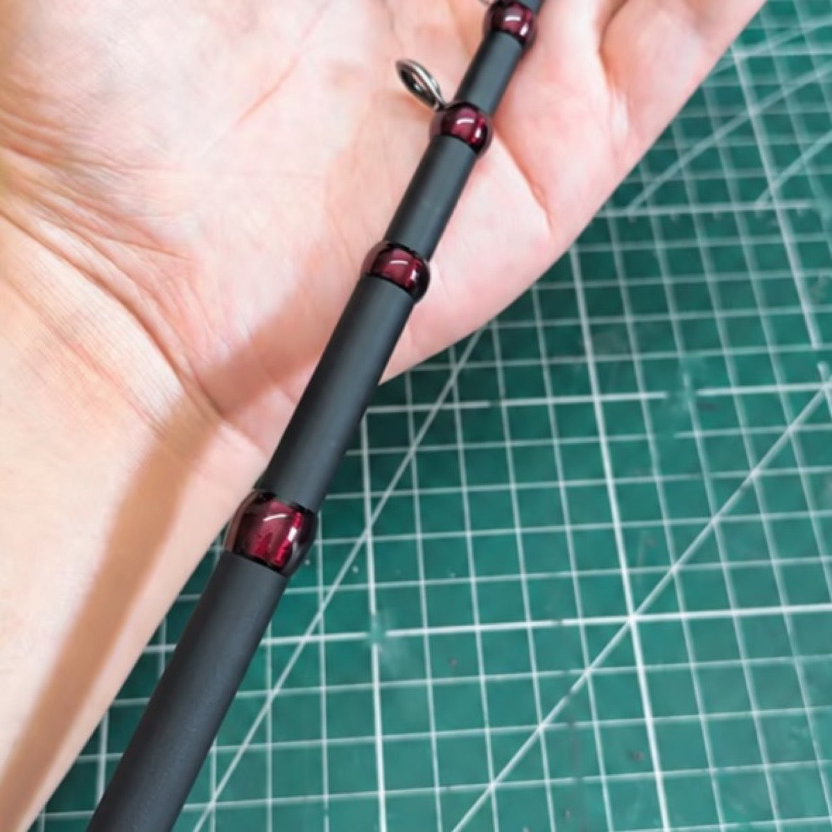 Custom compact telescopic travel rod — black blank reference; example finish.