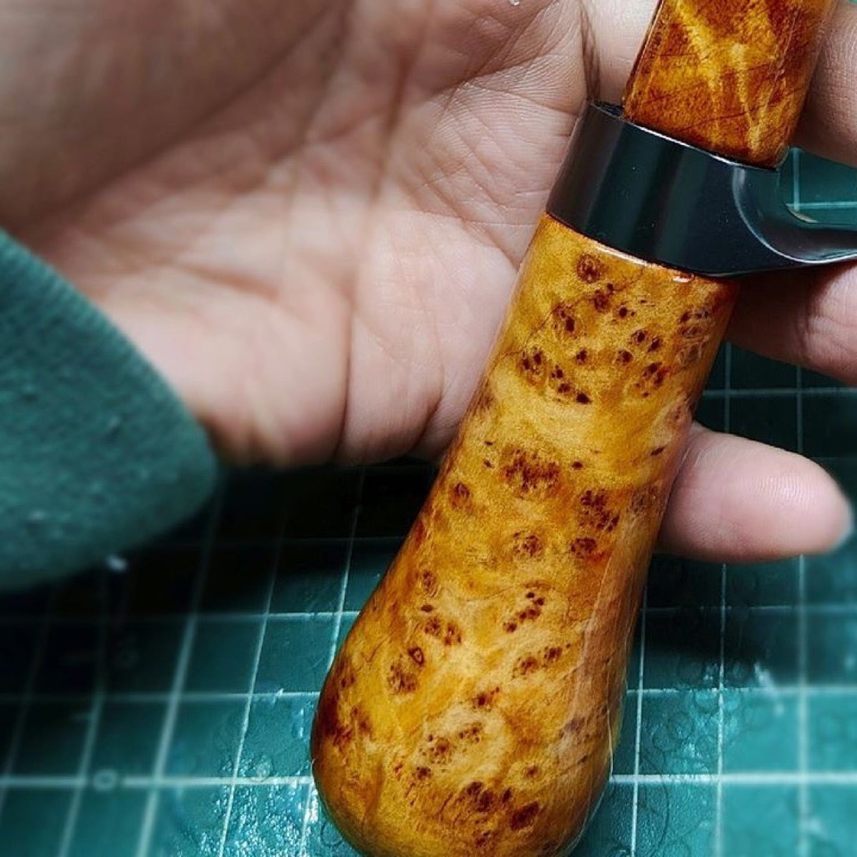 Cypress burl handle wood reference; natural grain varies.