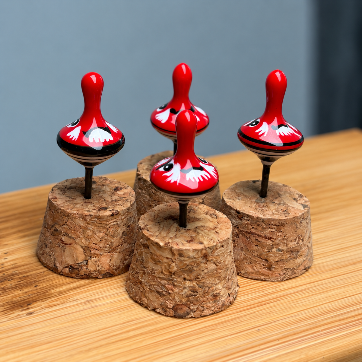 Angled view of red Daitengu handmade nano fishing floats; sold individually, display stands not included.