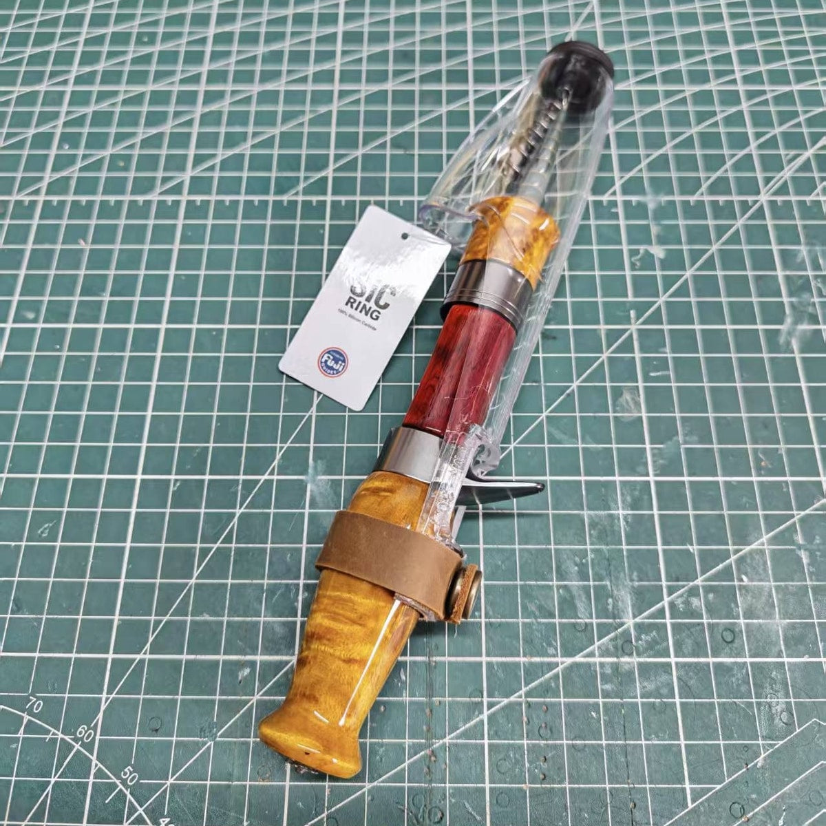 Covered Atelier Contour casting reference build showing its flared wood butt and dark hardware.