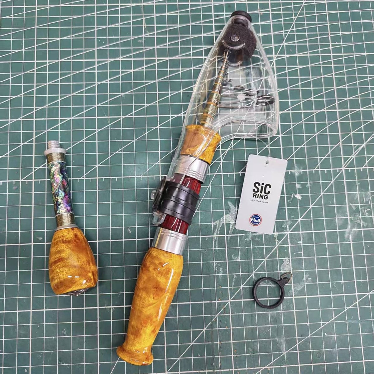 Covered Atelier Contour and its detached handle extension, showing the threaded connection and decorative connecting section.